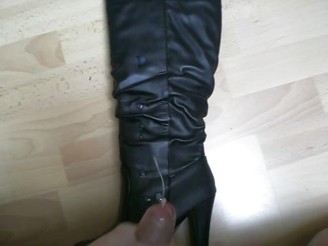 19P Cum on black boots
