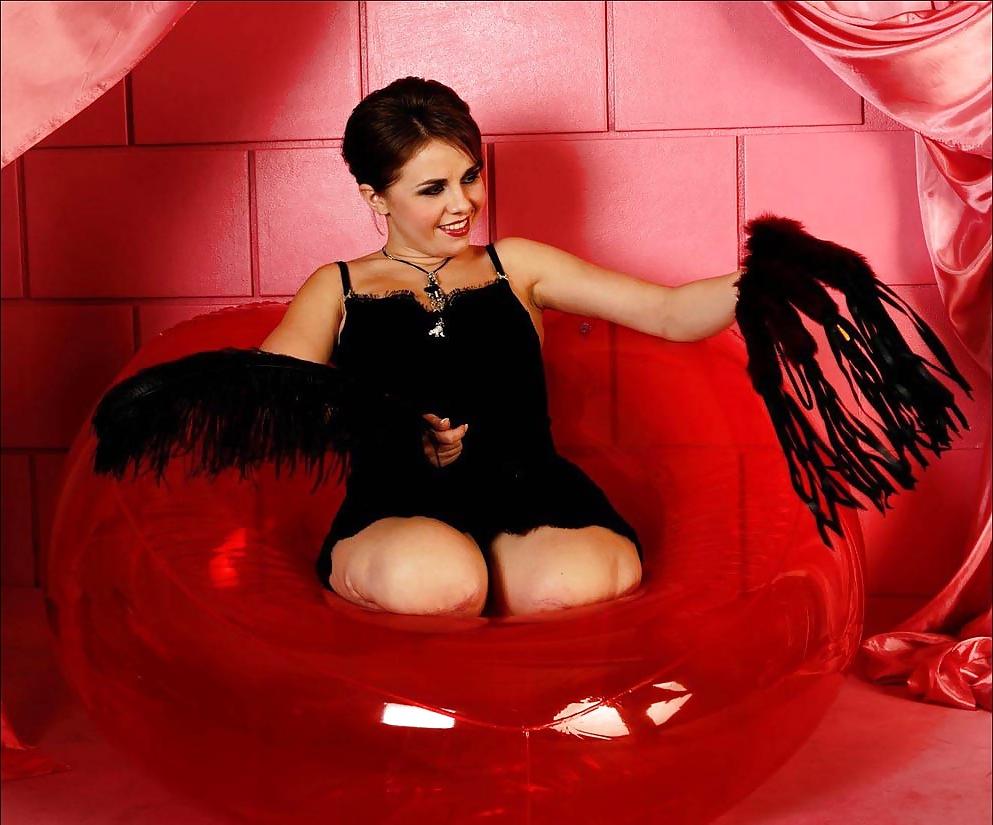 7P Sexy women without legs dressed as domina , amputee
