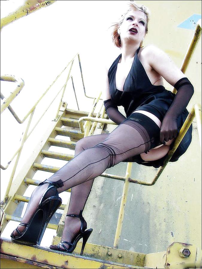 20P German lady climbs industrial stairs