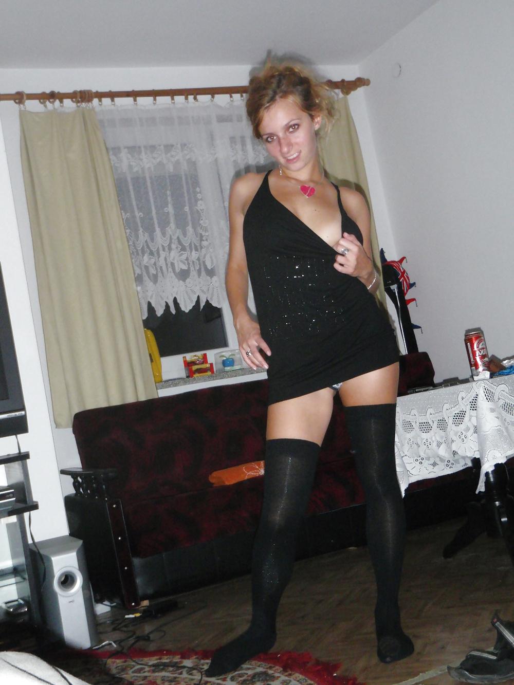 23P Kamila in lingerie with a whip