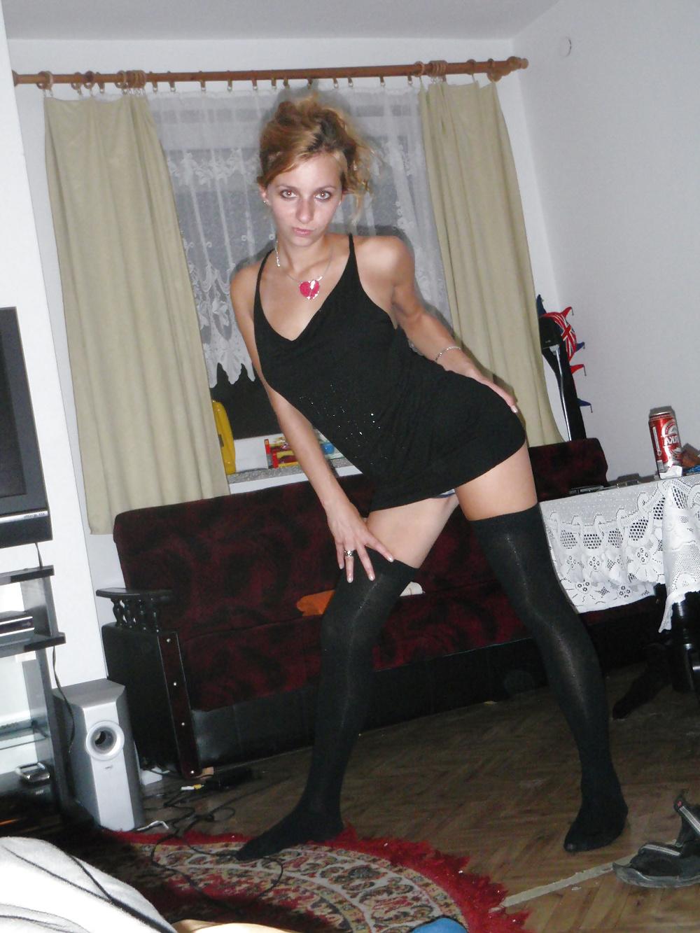 23P Kamila in lingerie with a whip