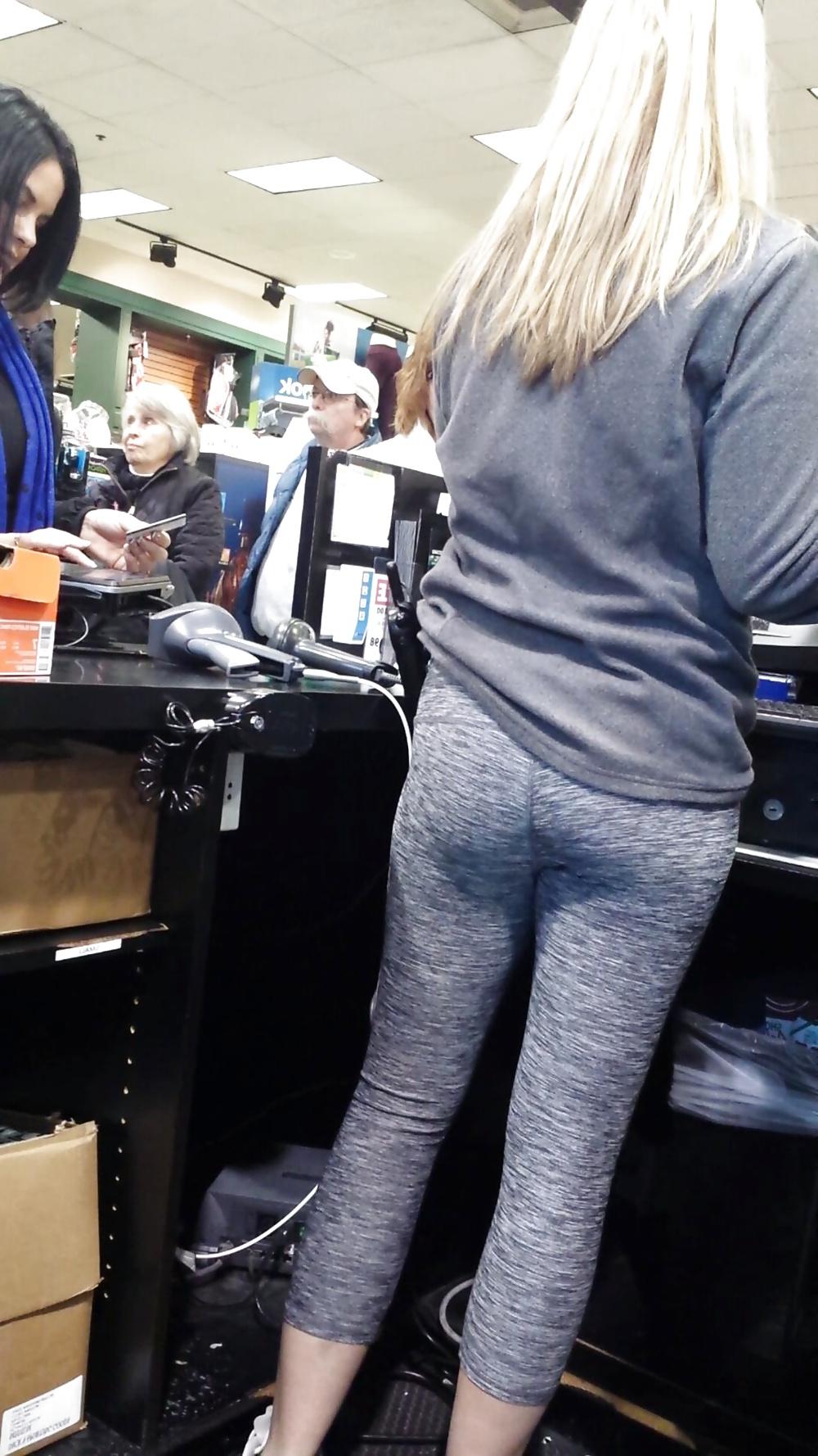 24P Candid cute young blonde in tight leggings yoga pants booty