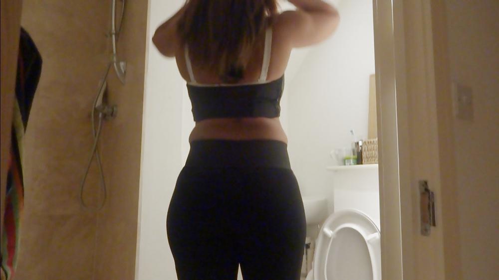 25P Stunning big booty Brazilian strips, showers and gets rimmed