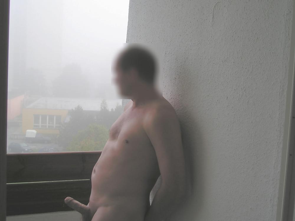 9P Nude on balcony