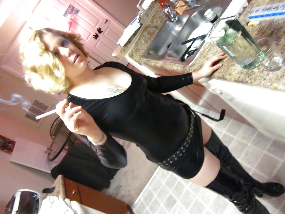 25P Baby slut stripper smokes pours wax on cock