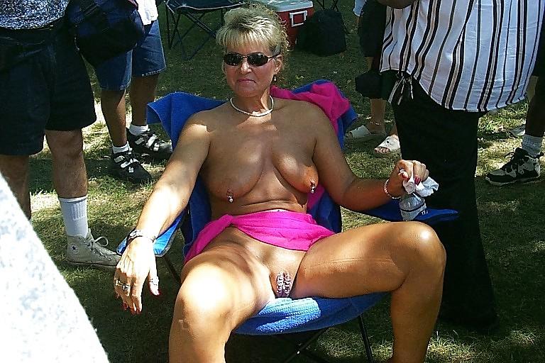 25P Some shaven pussy and some whit piercing.