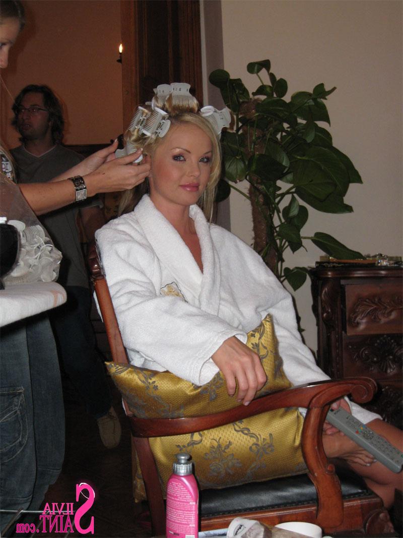 15P Ravishing blonde starlet Silvia Saint poses sensually in sexy clothes