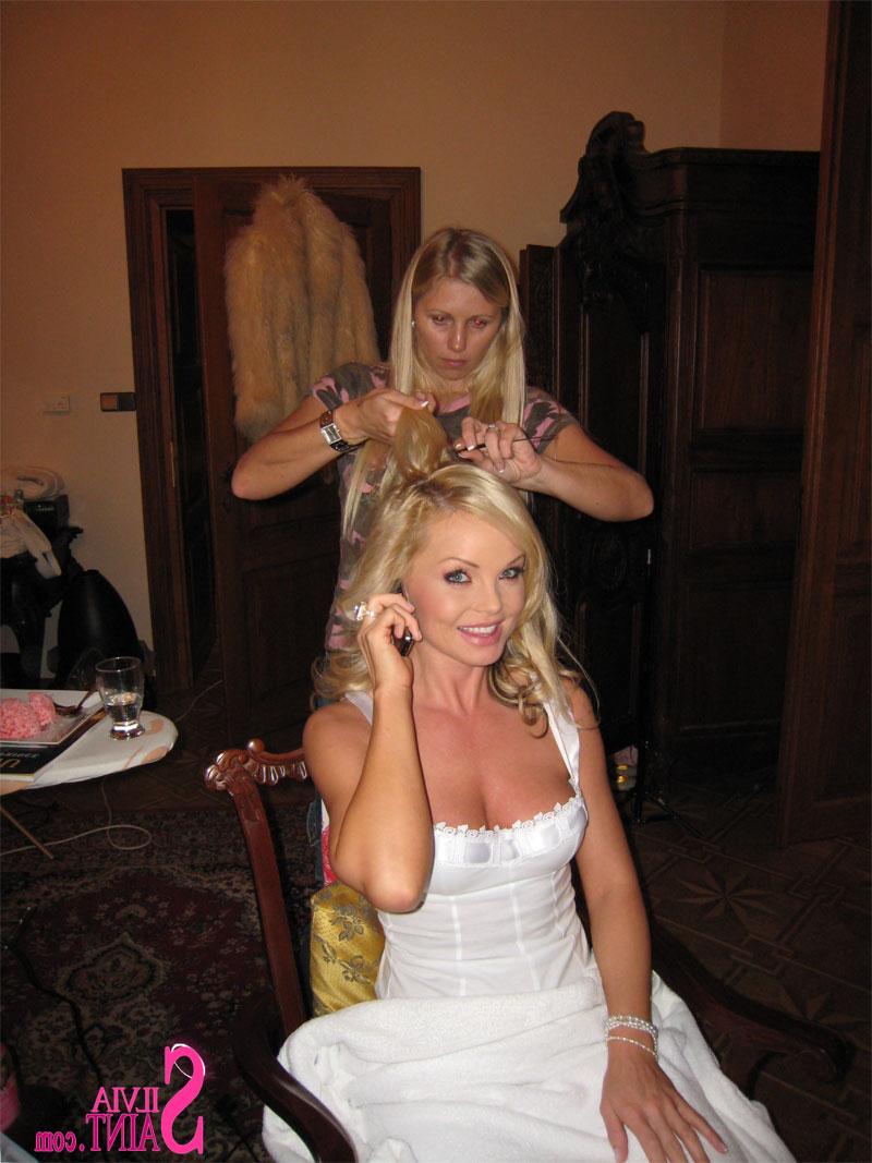 15P Ravishing blonde starlet Silvia Saint poses sensually in sexy clothes