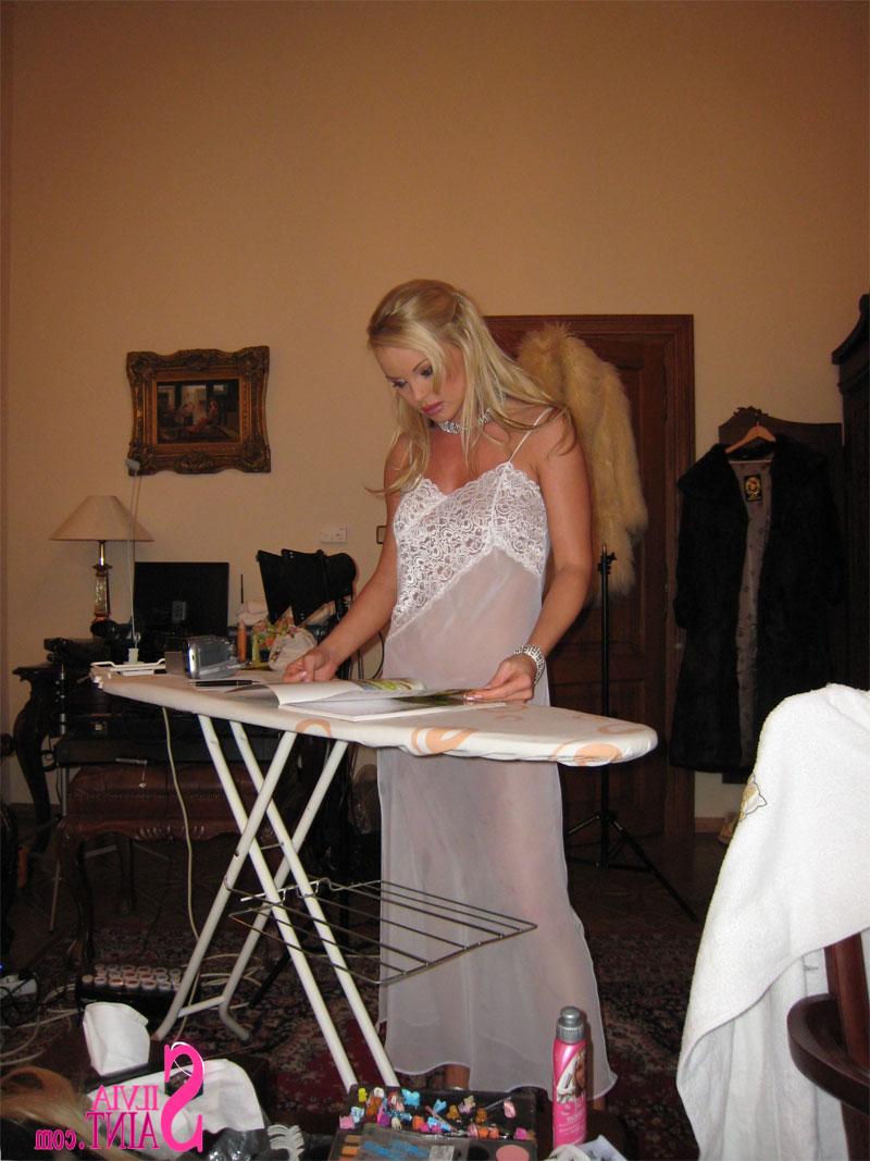 15P Ravishing blonde starlet Silvia Saint poses sensually in sexy clothes