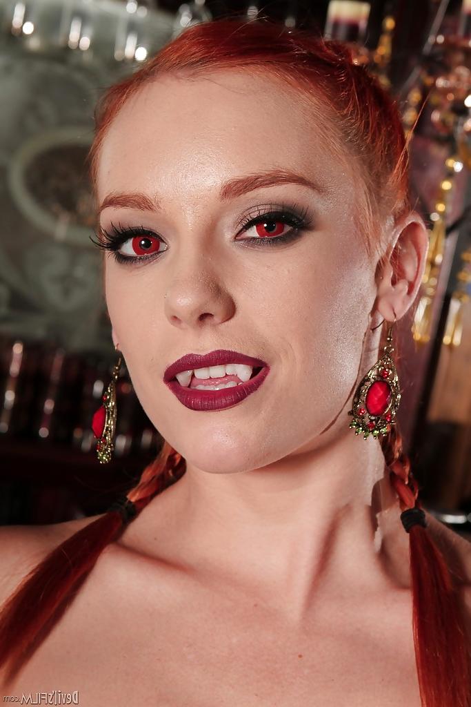 16P Sweet redhead babe in stockings Dani Jensen stripping off her clothes