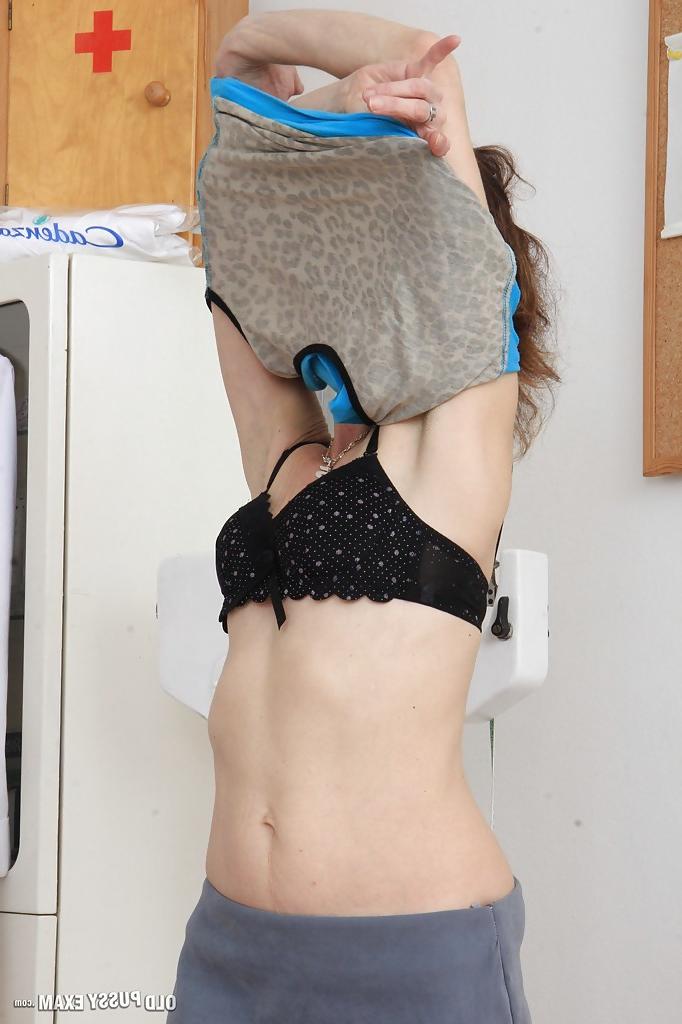 16P Older woman Andula strips naked for Gyno doctor examination
