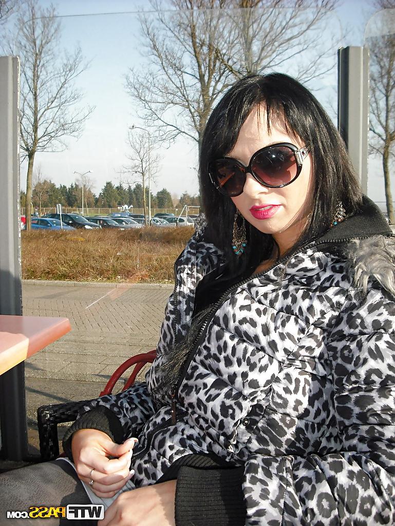 12P Lustful brunette babe in sunglasses uncovering her fuckable curves outdoor