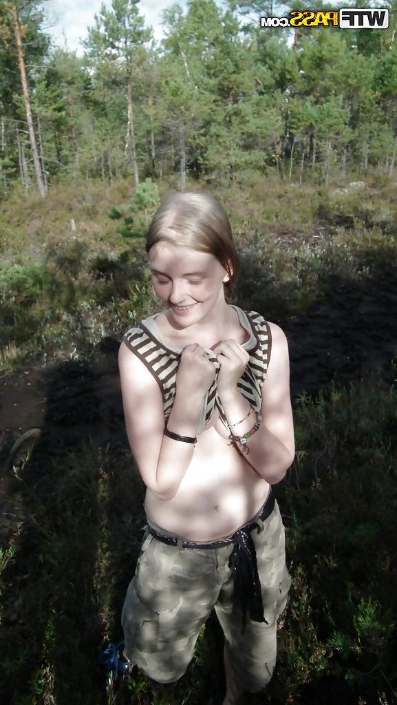 16P Outdoor posing with marvelous teen babe showing her ass in woods
