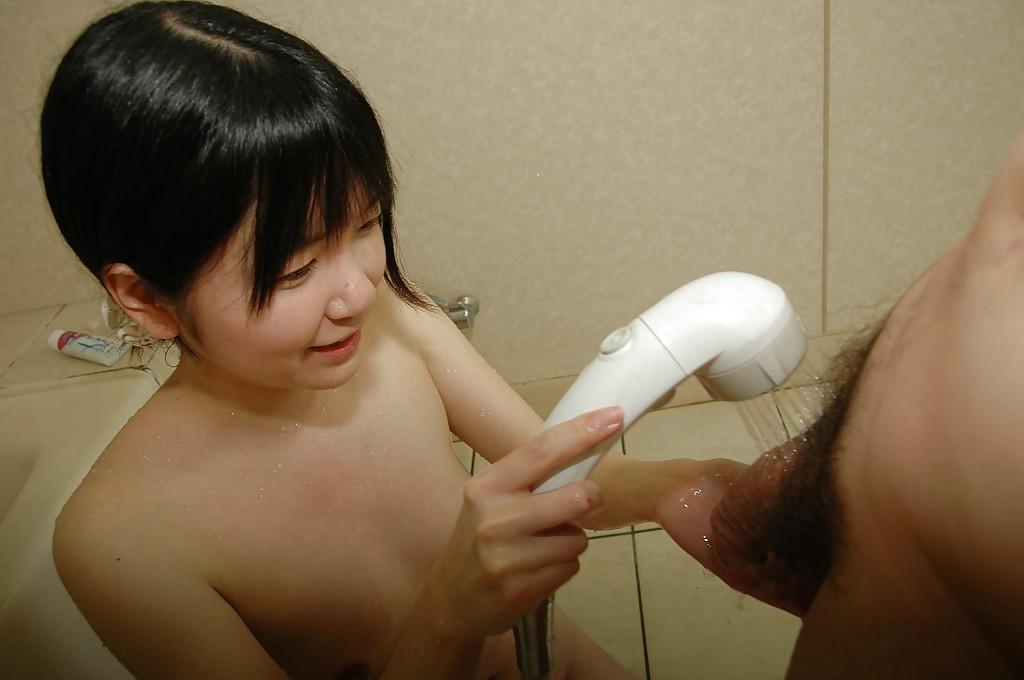 16P Lusty asian teen gives a sensual blowjob on a swollen cock in the bathroom