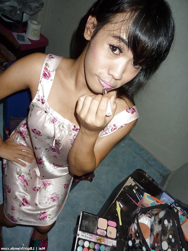 16P Young Thai tranny Mai playing with her big boobs and stroking her hard cock