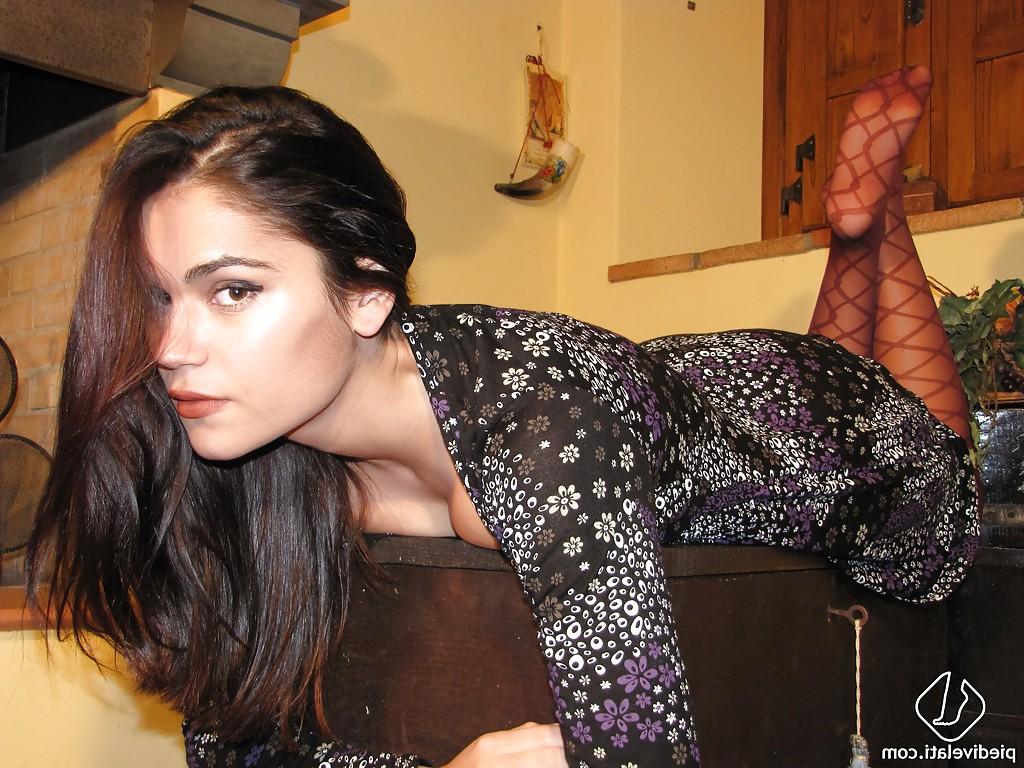 16P Smashing beauty Chiara is showing her sexy long legs in pantyhose