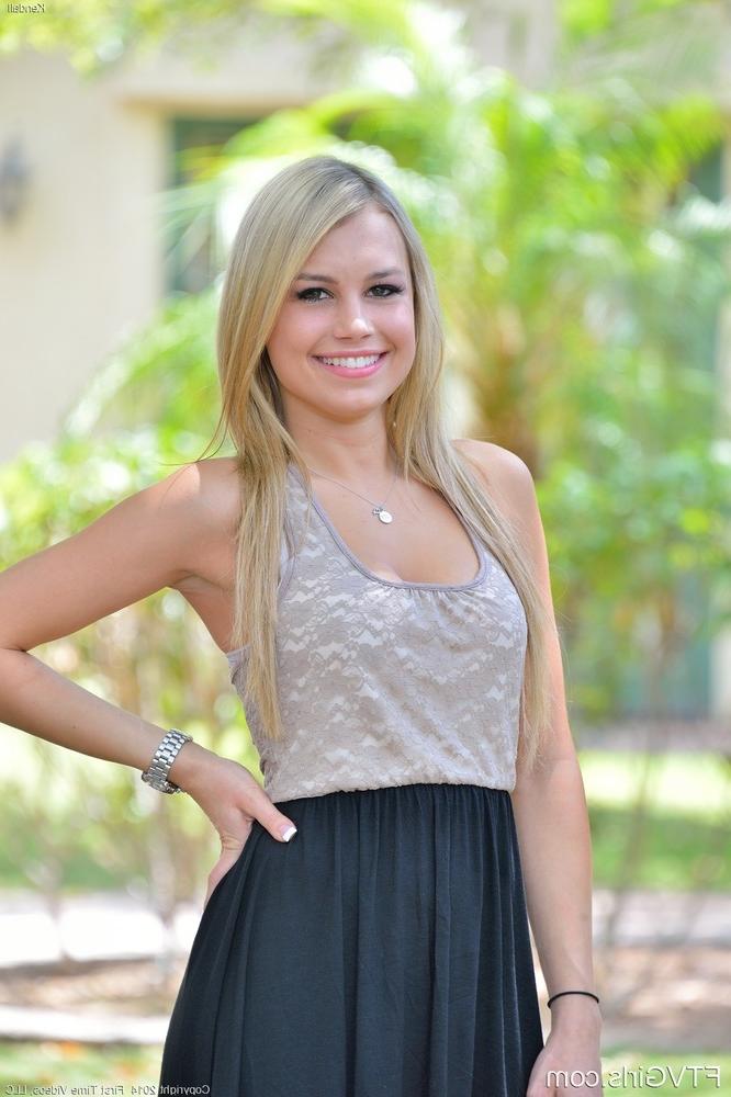 15P Cute blonde girl in black thong posing for sexy upskirt on the street