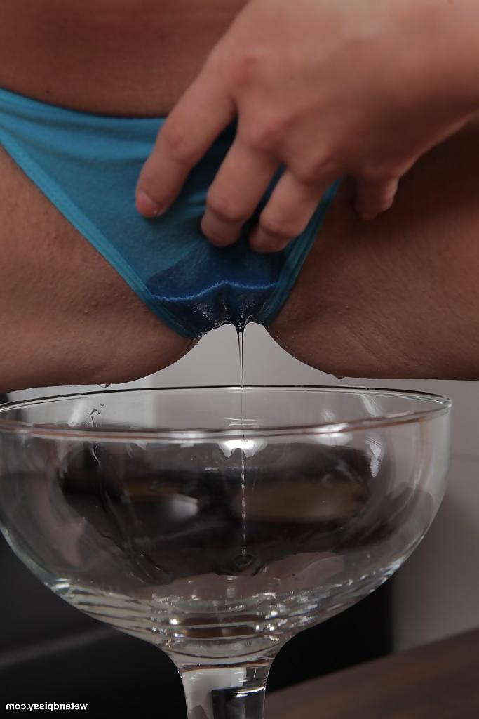 16P Italian solo girl Anita Berlusconi spreads wet teen pussy to piss in cup
