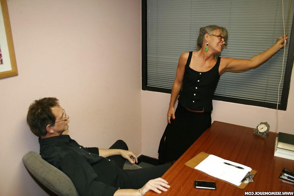 16P Mature secretary in glasses gives a great blowjob to her boss