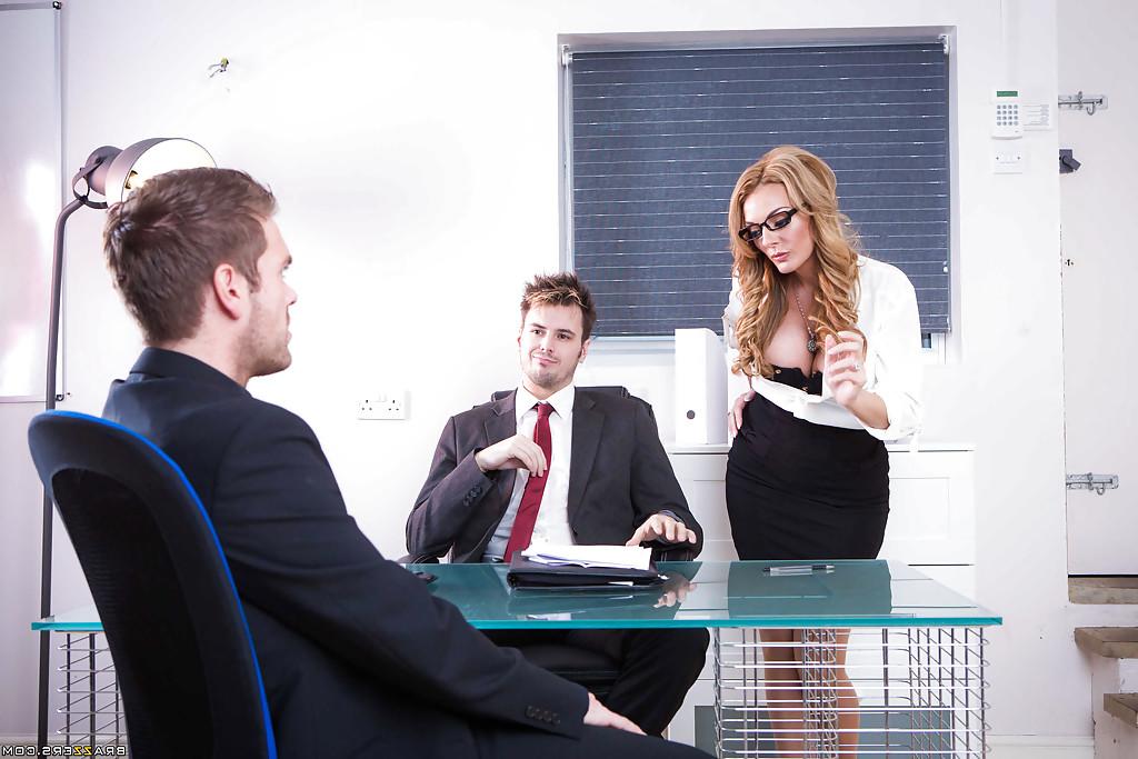 16P Chesty blonde MILF Stacey Saran giving boss blowjob in front of co-workers