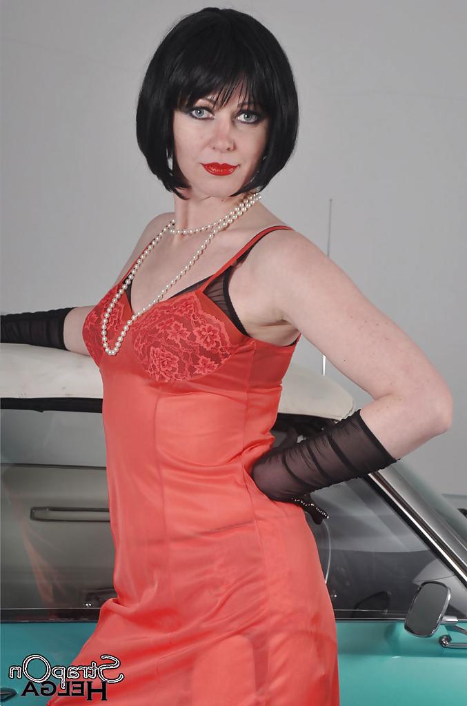 16P Cuddly milf Helga loves working with a huge strapon on camera