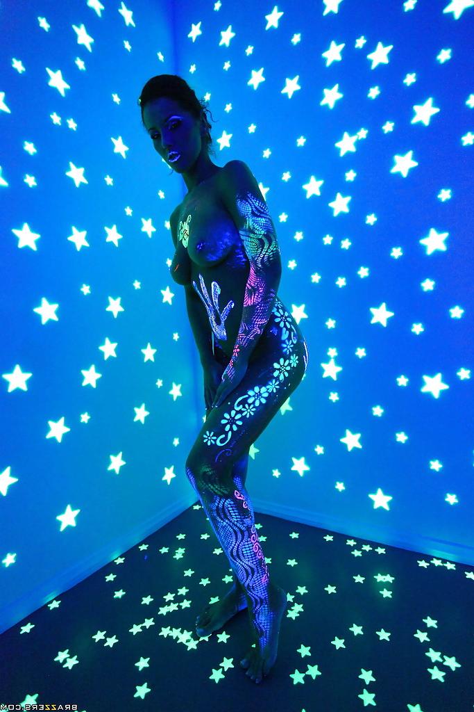 16P Angel Dark has her sexy booty and tits prettified with glowing bodyart