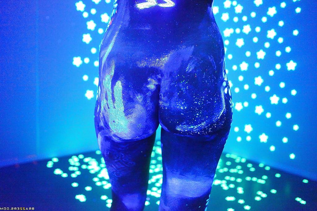 16P Angel Dark has her sexy booty and tits prettified with glowing bodyart