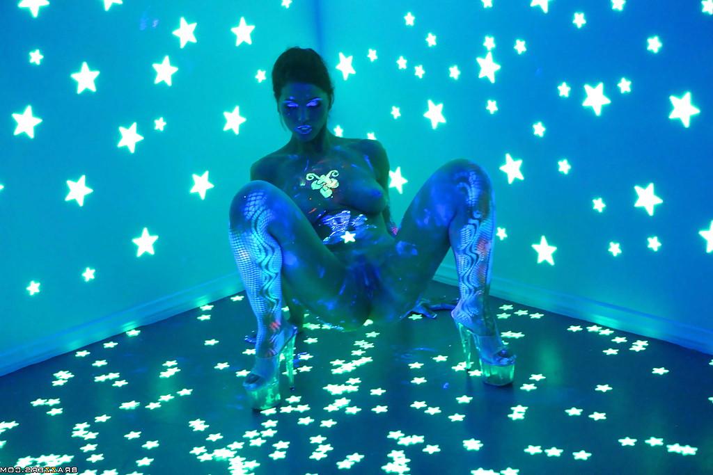 16P Angel Dark has her sexy booty and tits prettified with glowing bodyart