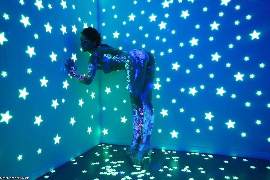 16P Angel Dark has her sexy booty and tits prettified with glowing bodyart