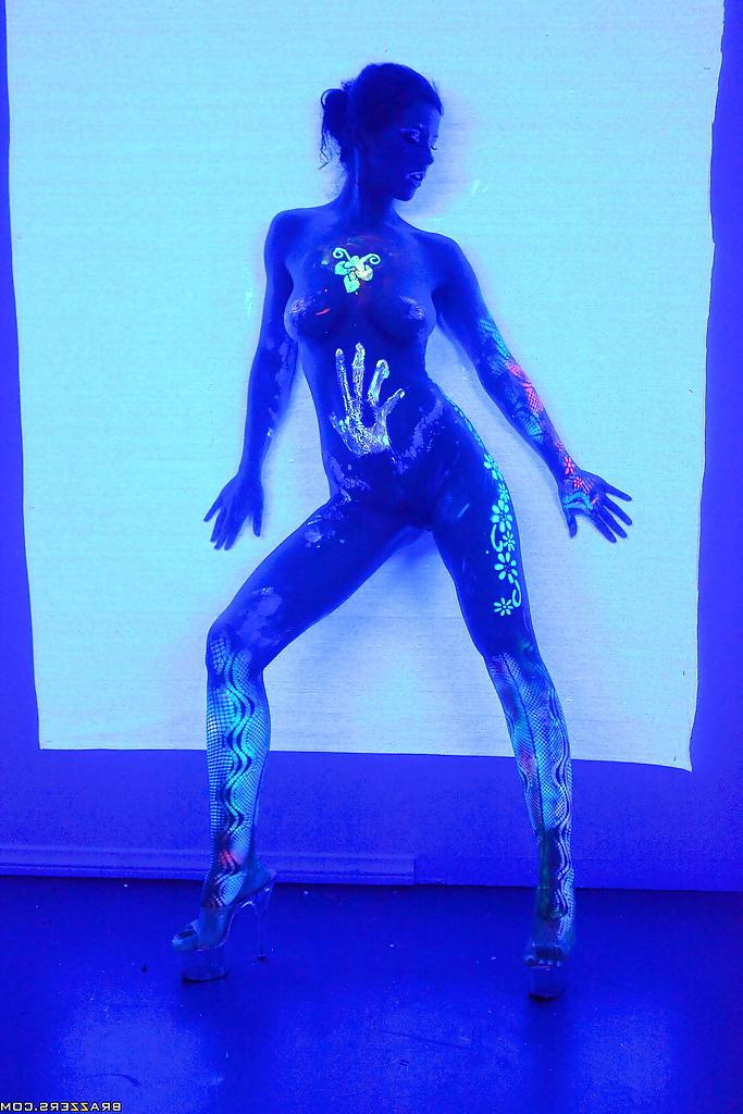 16P Angel Dark has her sexy booty and tits prettified with glowing bodyart