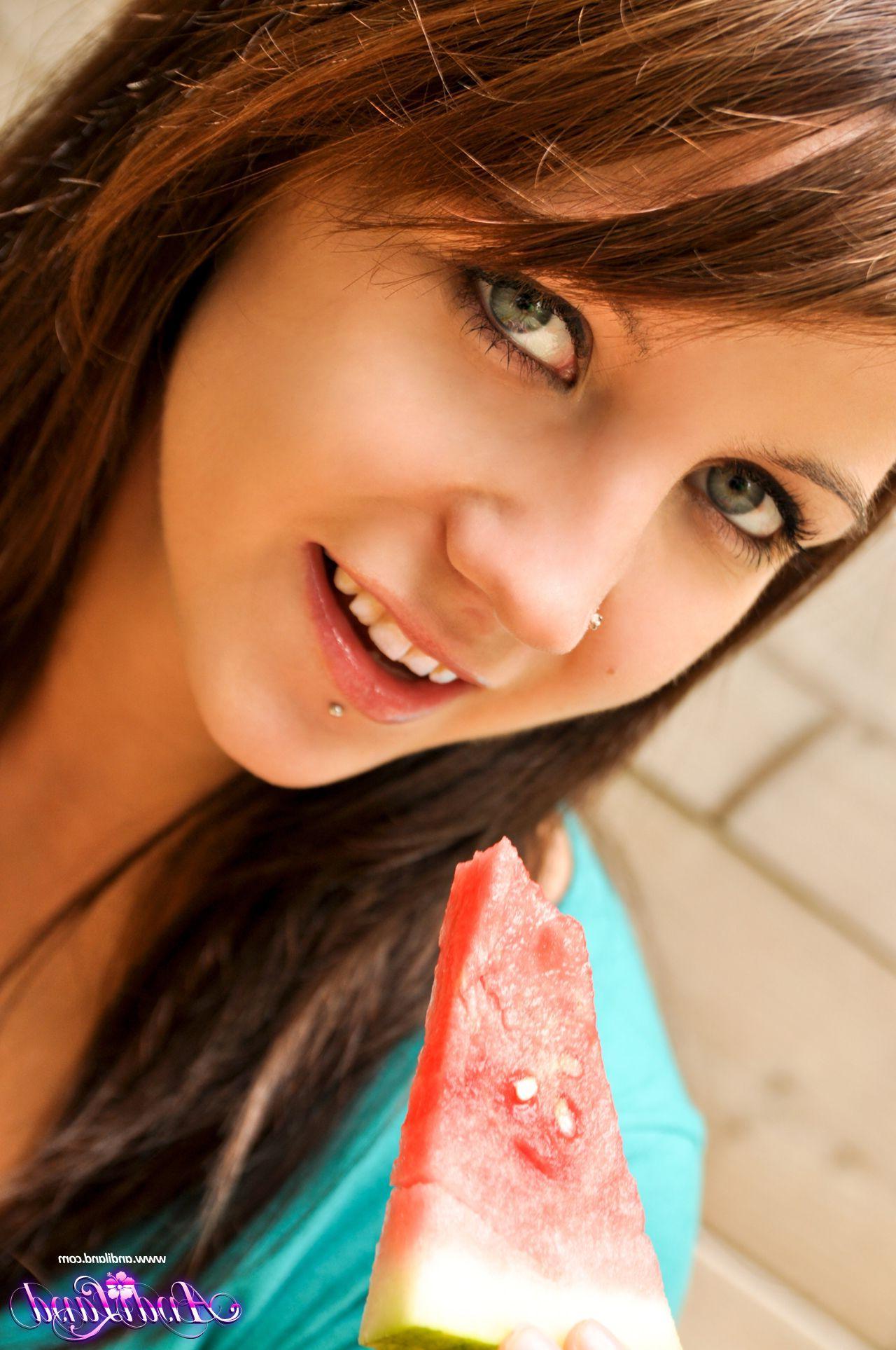 15P Pictures of Andi Land eating something sweet