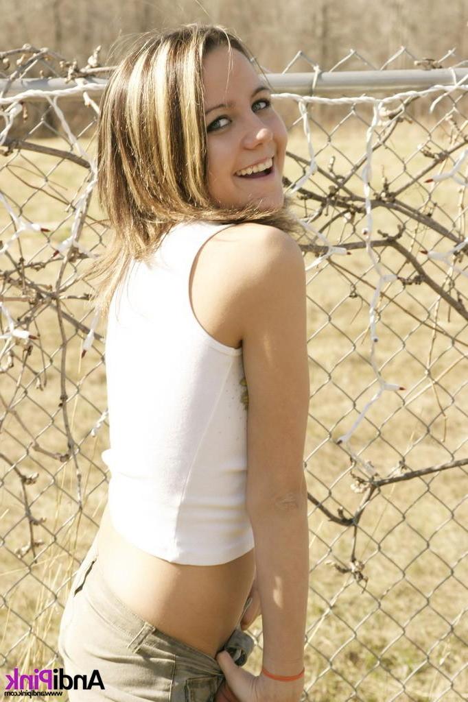 15P Pictures of Andi Pink showing you her tits and pussy outside