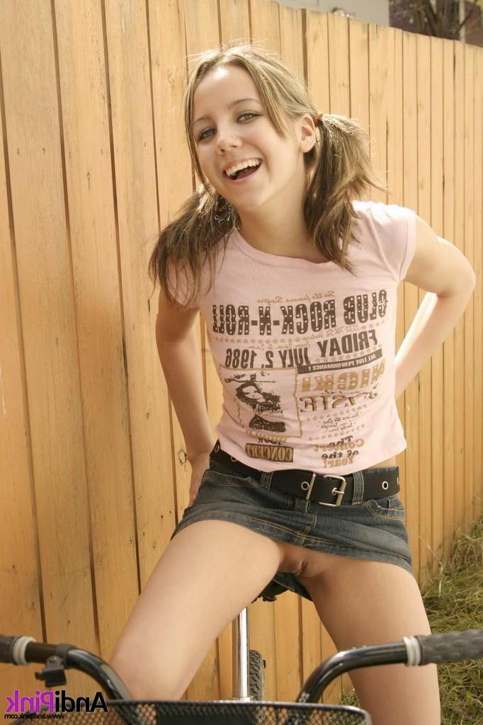 15P Pictures of Andi Pink showing you her pussy upskirt