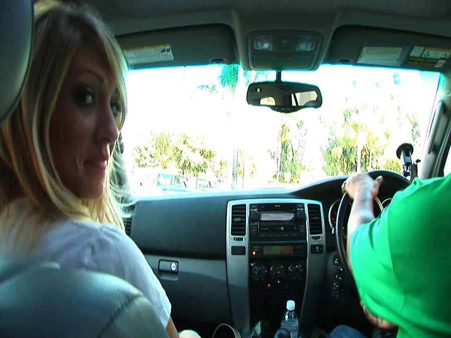 16P Big titted babe Carmen Kinsley gives a titjob to a monster cock
