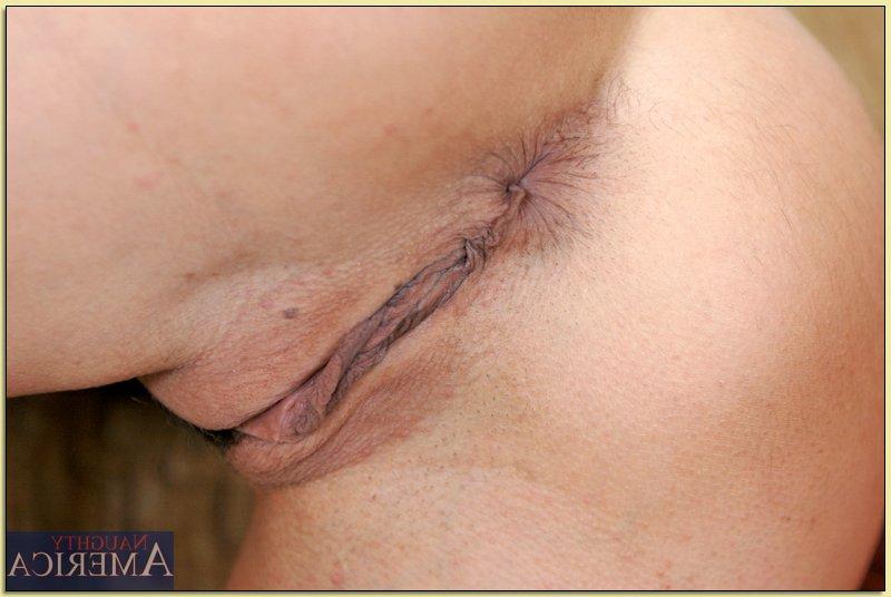 16P Busty mature Devon Michaels caressing huge tits and spreading booty