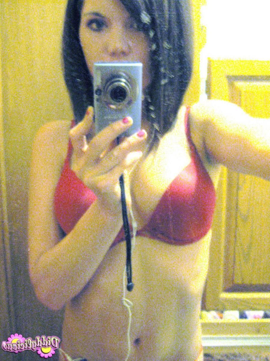 12P Diddy takes selfshot mirror pictures of her juicy tits in a tight bra