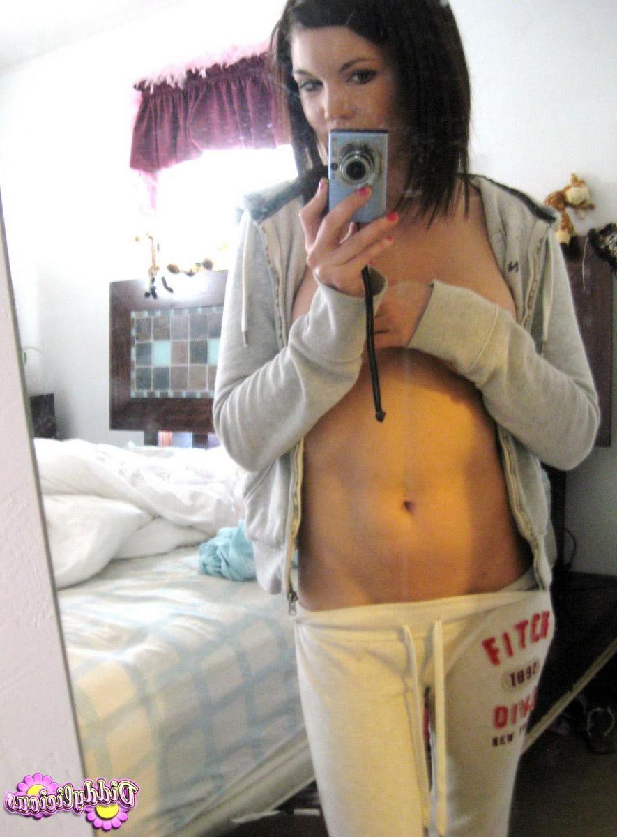 12P Diddy takes selfshot mirror pictures of her juicy tits in a tight bra