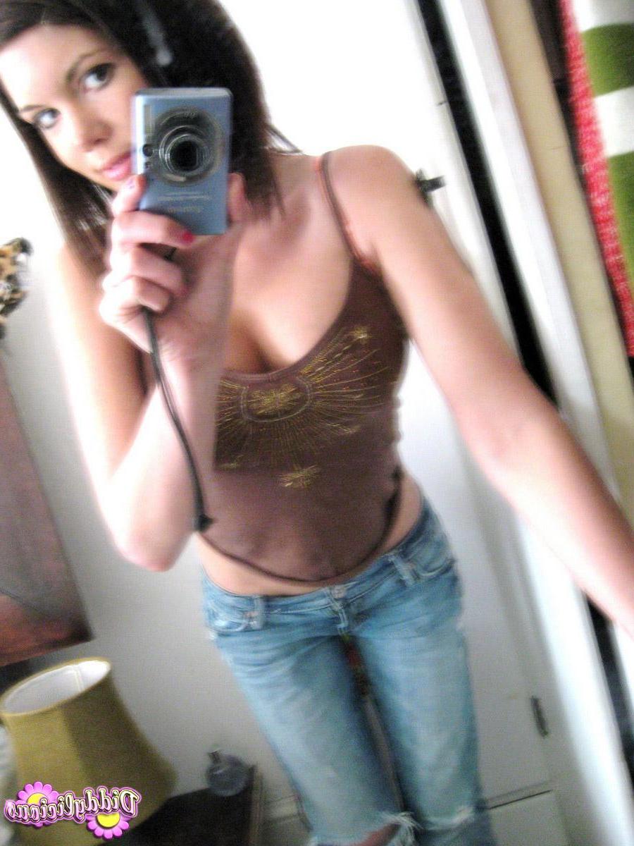 12P Diddy takes selfshot mirror pictures of her juicy tits in a tight bra