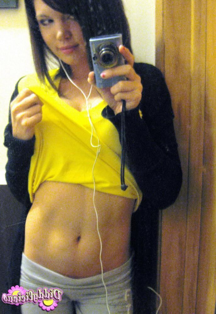 12P Diddy takes selfshot mirror pictures of her juicy tits in a tight bra