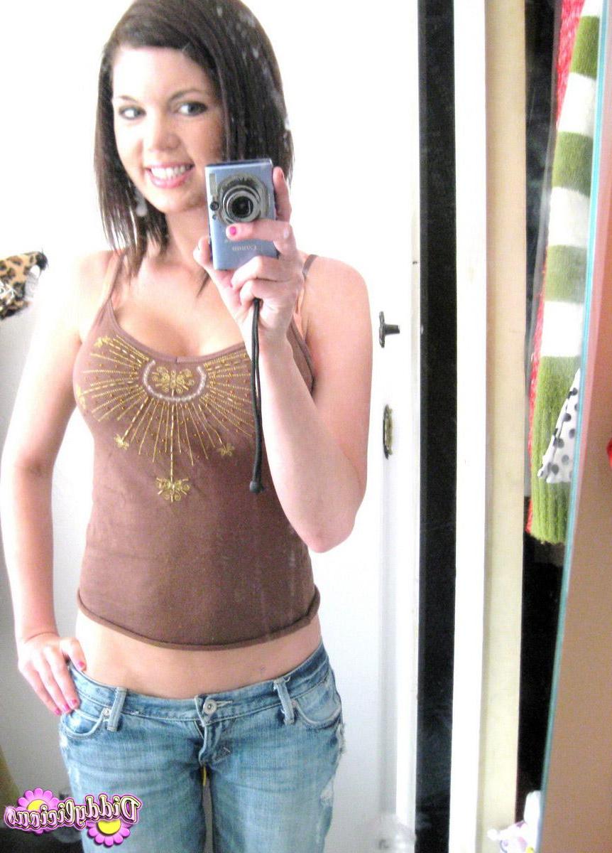 12P Diddy takes selfshot mirror pictures of her juicy tits in a tight bra