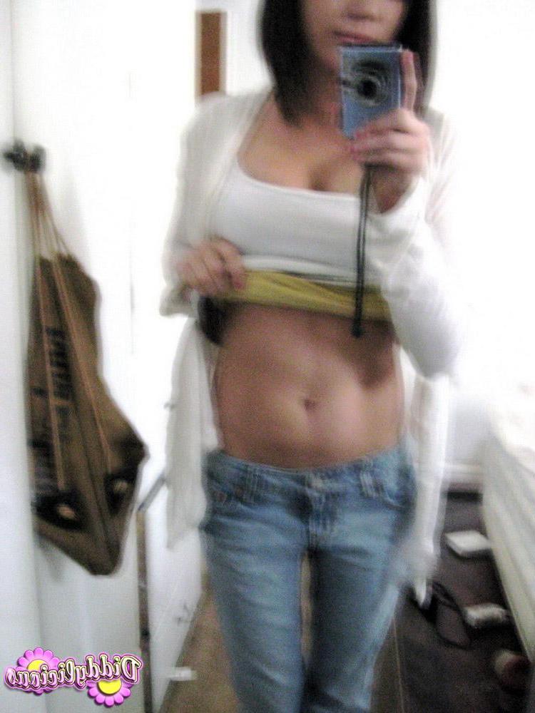 12P Diddy takes selfshot mirror pictures of her juicy tits in a tight bra
