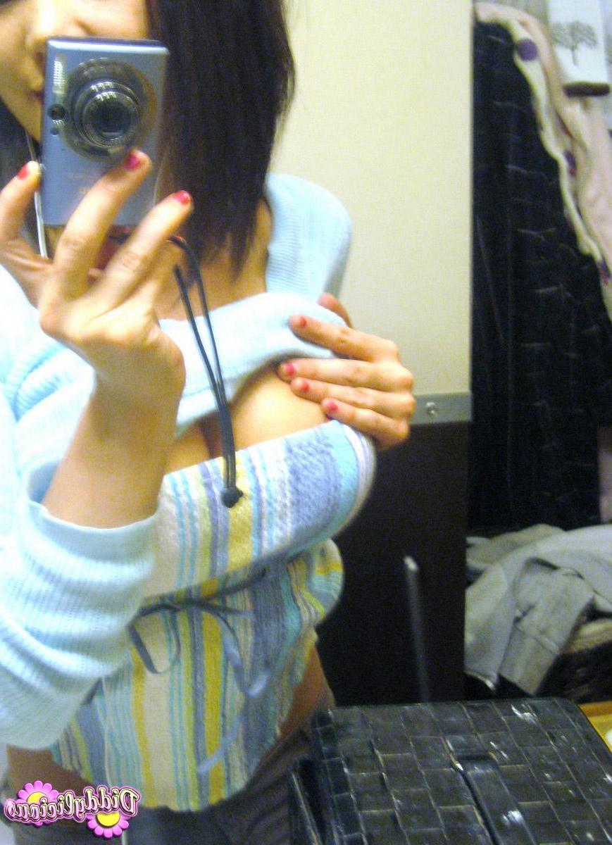 12P Horny teen Diddy takes pictures of her juicy tits in the mirror