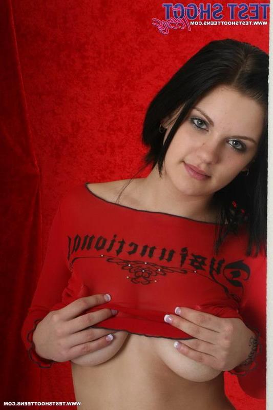 16P Sweet brunette teen Eva shows off her big boobs in a red top