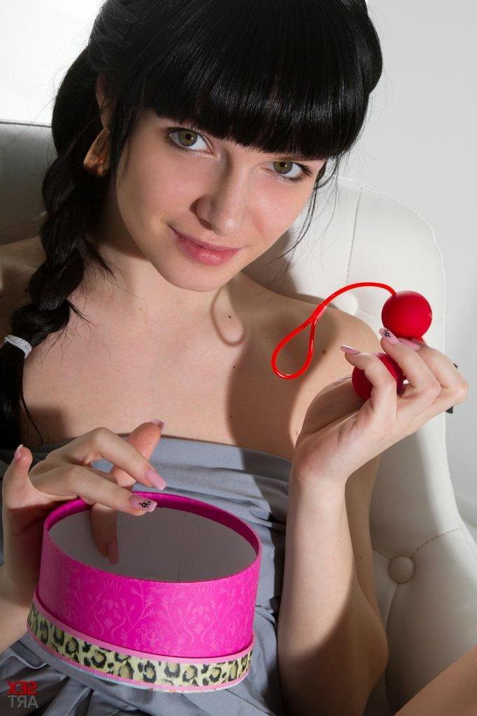 12P Milania masturbates with her red anal beads and oozes with raw eroticism