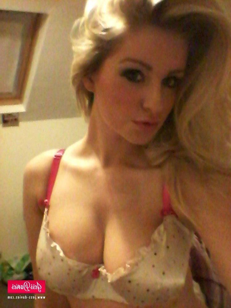12P Jess Davies strips from her spotted white lingerie to reveal her big round boobs