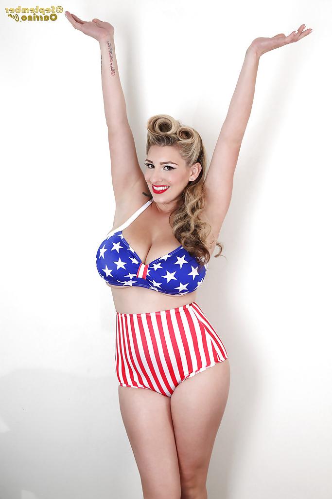 16P Lascivious babe September Carrino poses in American style underwear