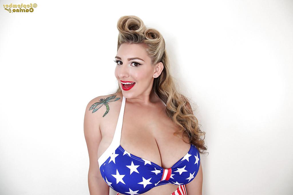 16P Lascivious babe September Carrino poses in American style underwear