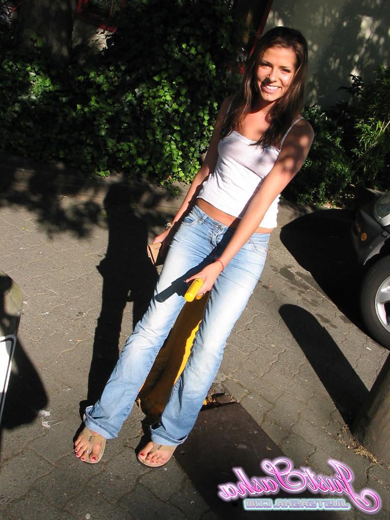 20P Pictures of teen Just Sasha showing off her nipples through her shirt