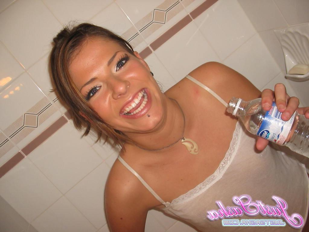 20P Pictures of teen babe Just Sasha making herself all wet