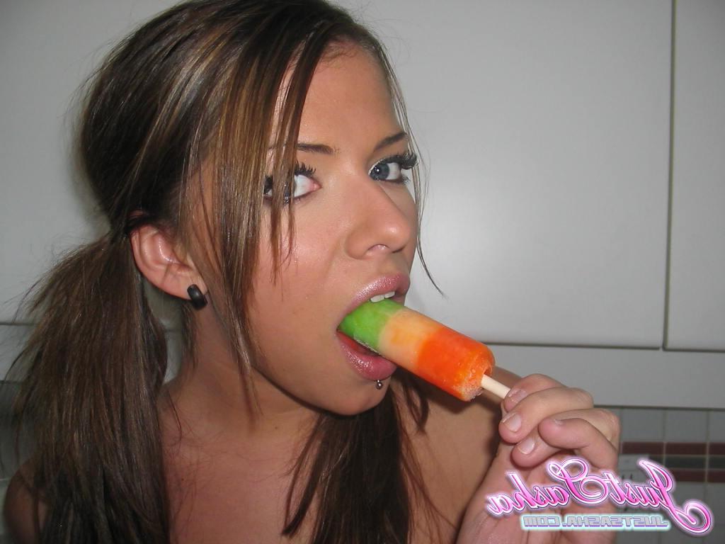 20P Pictures of teen amateur Just Sasha eating a popsicle